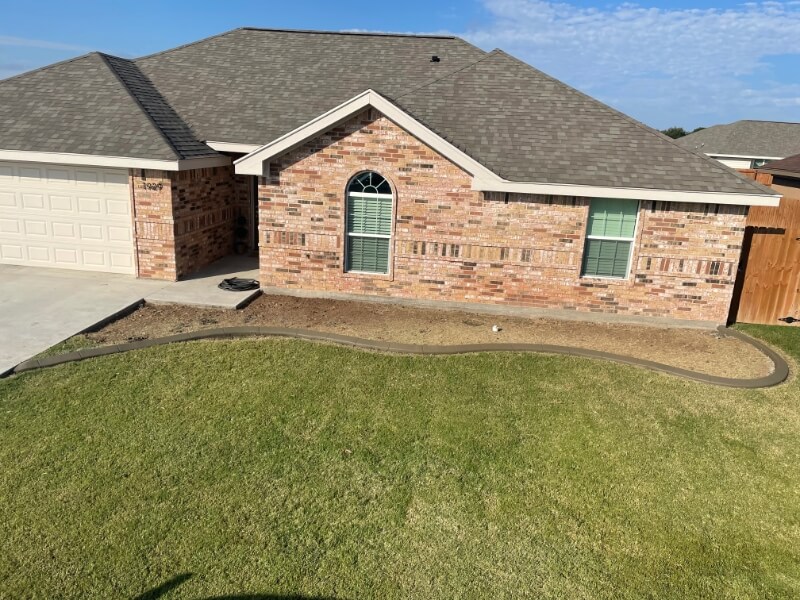 front of house with curbing