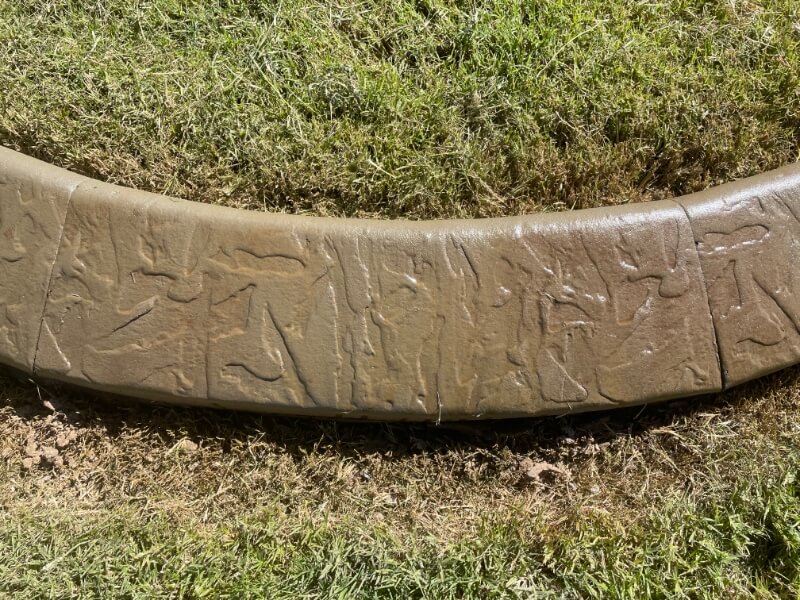 brown custom concrete and landscape curbing